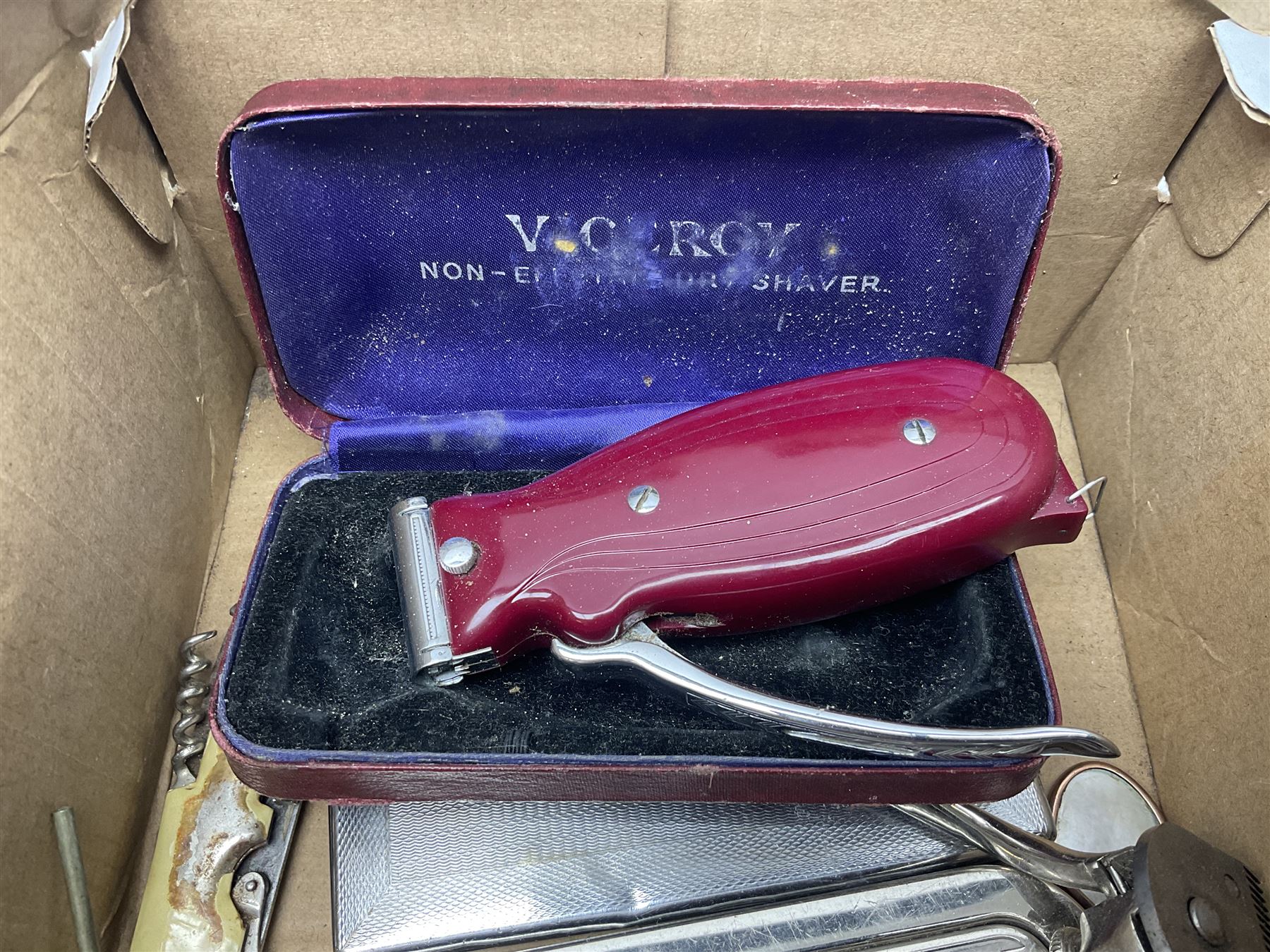 Collection of various razors and smoking items to include Ronson brass table lighter, Rolls Razor, Seigneur case with lighter, etc