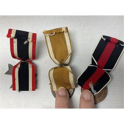 Three WW2 German medals - Defences Medal, Czech Occupation Commemorative Medal and War Merit Cross; all with ribbons (3)