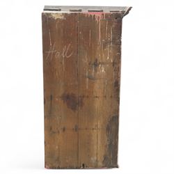 19th century oak wall hanging corner cupboard, moulded cornice above a panelled door enclosing shaped interior shelves, finished in green paint to the backboards