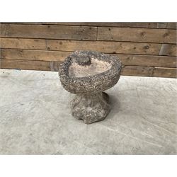 Collection of 9 decorative stone garden objects including sun dial small troughs mill stone and more,
