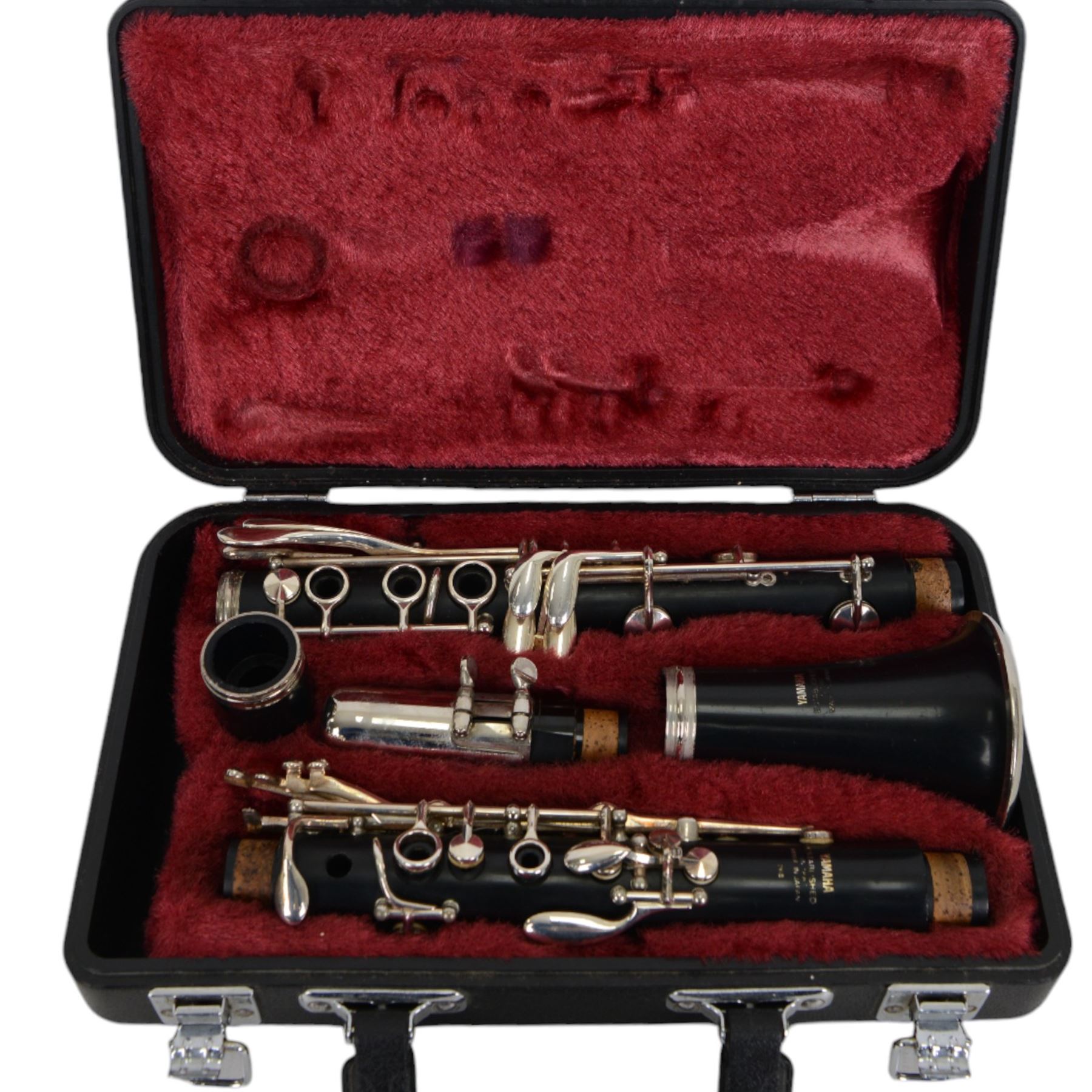 Yamaha 26 student clarinet, with a resin body and chrome keys, in a velvet lined and padded hard case.