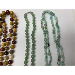 Collection of bead necklaces including green aventurine flower necklace, with silver clasp, rose quartz flower bracelet, agate bead necklace, with matching bracelet, silver chains, pearl wristwatch, etc