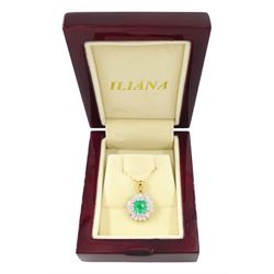 18ct gold Colombian emerald and diamond cluster pendant by Iliana, single octagonal cut emerald of 1.65 carat, surrounded by two rows of twenty round brilliant cut diamonds, spaced by eight tapered baguette cut diamonds, hallmarked, total diamond weight 0.96 carat