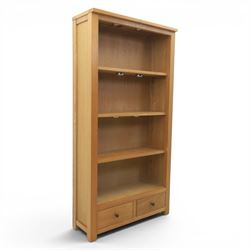 Contemporary oak open bookcase, fitted with two base drawers