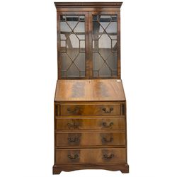 Reproduction mahogany bureau bookcase, the glazed bookcase over fall front bureau fitted with four drawers, on bracket feet