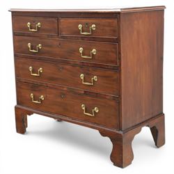 Small late Georgian mahogany chest, rectangular moulded top, above two short and three graduating long drawers, finished with square swan neck handles, raised on ogee bracket feet 