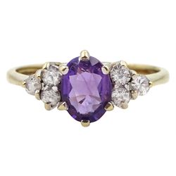 9ct gold oval amethyst and six stone cubic zirconia ring, hallmarked