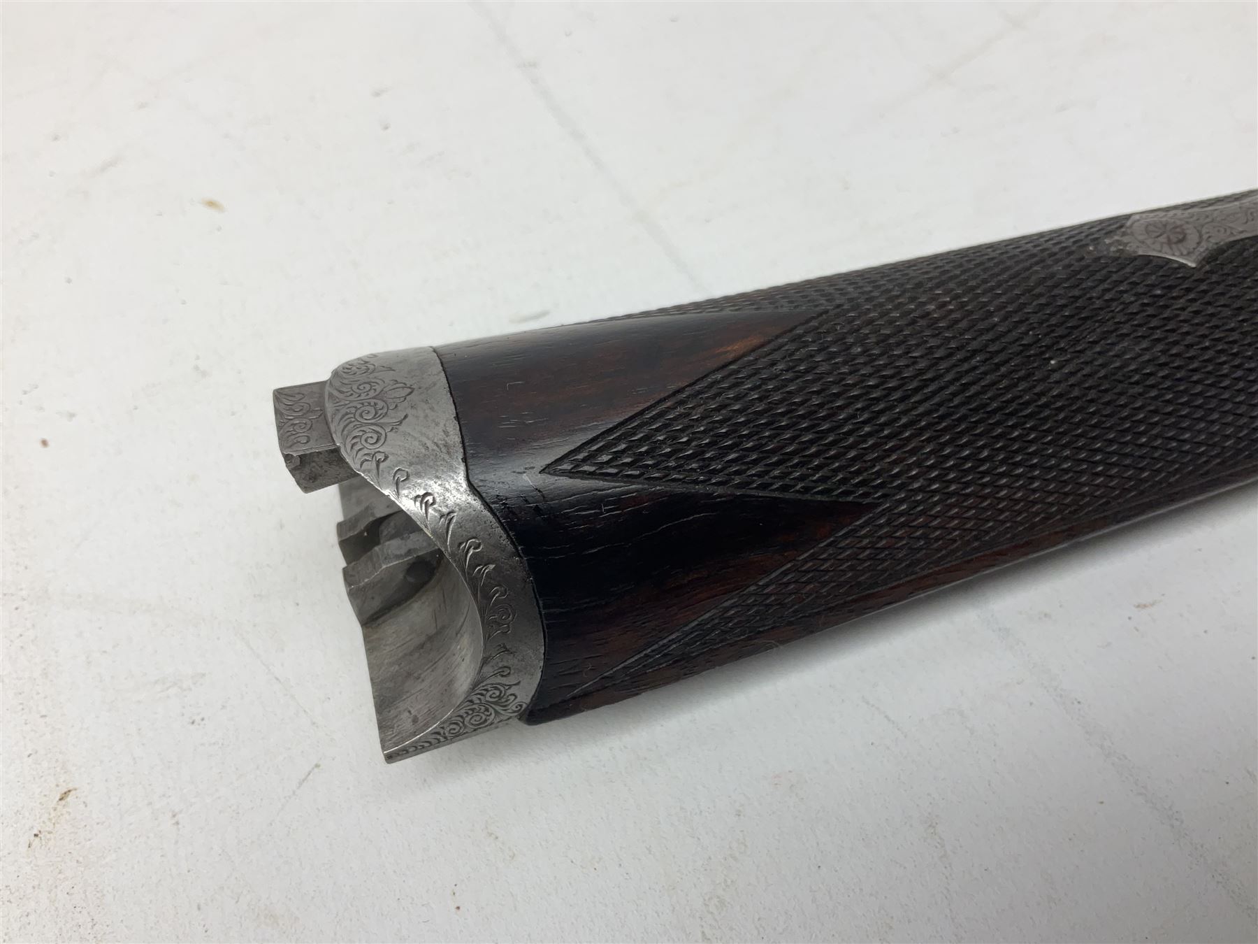 W.W. Greener 12-bore side-by-side double barrel non-ejector shotgun, with 76cm barrels, side safety, engraved lock, figured walnut stock with chequered grip and fore-end, no.33408, 120.5cm overall; in fitted canvas covered case with tools and accessories including .22 12-bore dog training device. SHOTGUN CERTIFICATE REQUIRED.