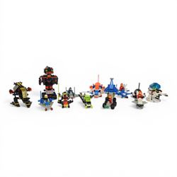 Eleven vintage Lego spaceships, comprising no. 6811 Pulsar Charger, no. 6824 Space Dart, no. 6832 Super Nova II, no. 6846 Tri-Star Voyager, no. 6842 Shuttle Craft, no. 6879 Blizzard Baron, no. 6889 Recon Robot, no. 6848-1 Strategic Pursuer, no. 6803 Space Patrol, no. 6876 Alienator and no. 6871 Star Patrol Launcher, all built with minifigures