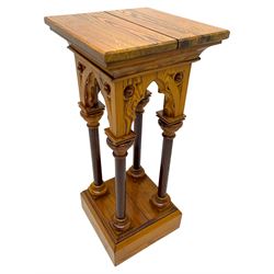 19th century pitch pine ecclesiastical pedestal stand, the square chamfered top over cusped Gothic pointed arches and four turned column supports, stepped and moulded plinth base
