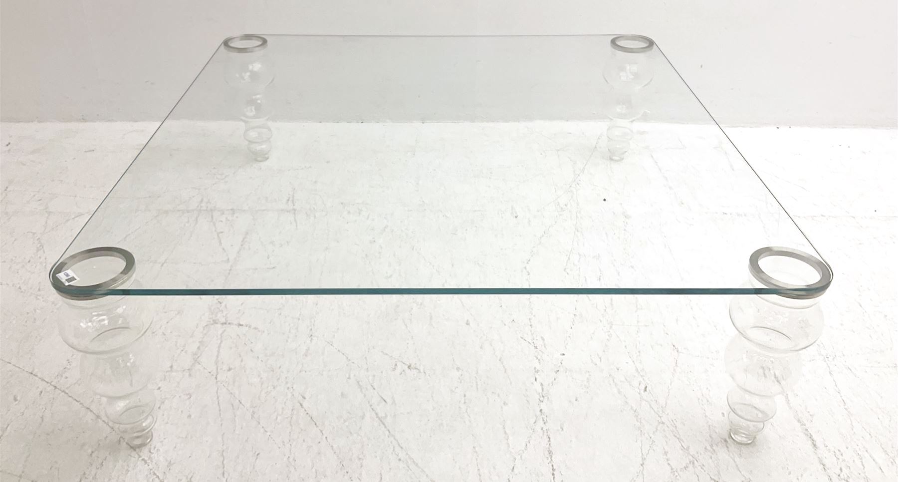 Gallotti and Radice - contemporary glass coffee table, rounded square top on turned vasiform glazed supports 