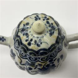 18th century Chinese blue and white teapot, painted with floral sprays, with lobed body and cover, H11cm