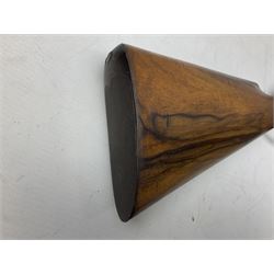 Manton .577/450 Martini Henry rifle, the 82.5cm smooth bored barrel proofed for shot, two barrel bands and bayonet fitting, engraved action with side safety, figured walnut stock with chequered steel butt plate, complete with ramrod, NVN other than 5346 on barrel, L125cm