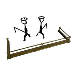 Pair of wrought metal fire dogs or andirons (H49cm, D43cm); and a late 19th century brass telescopic fire fender (W133cm (closed))
