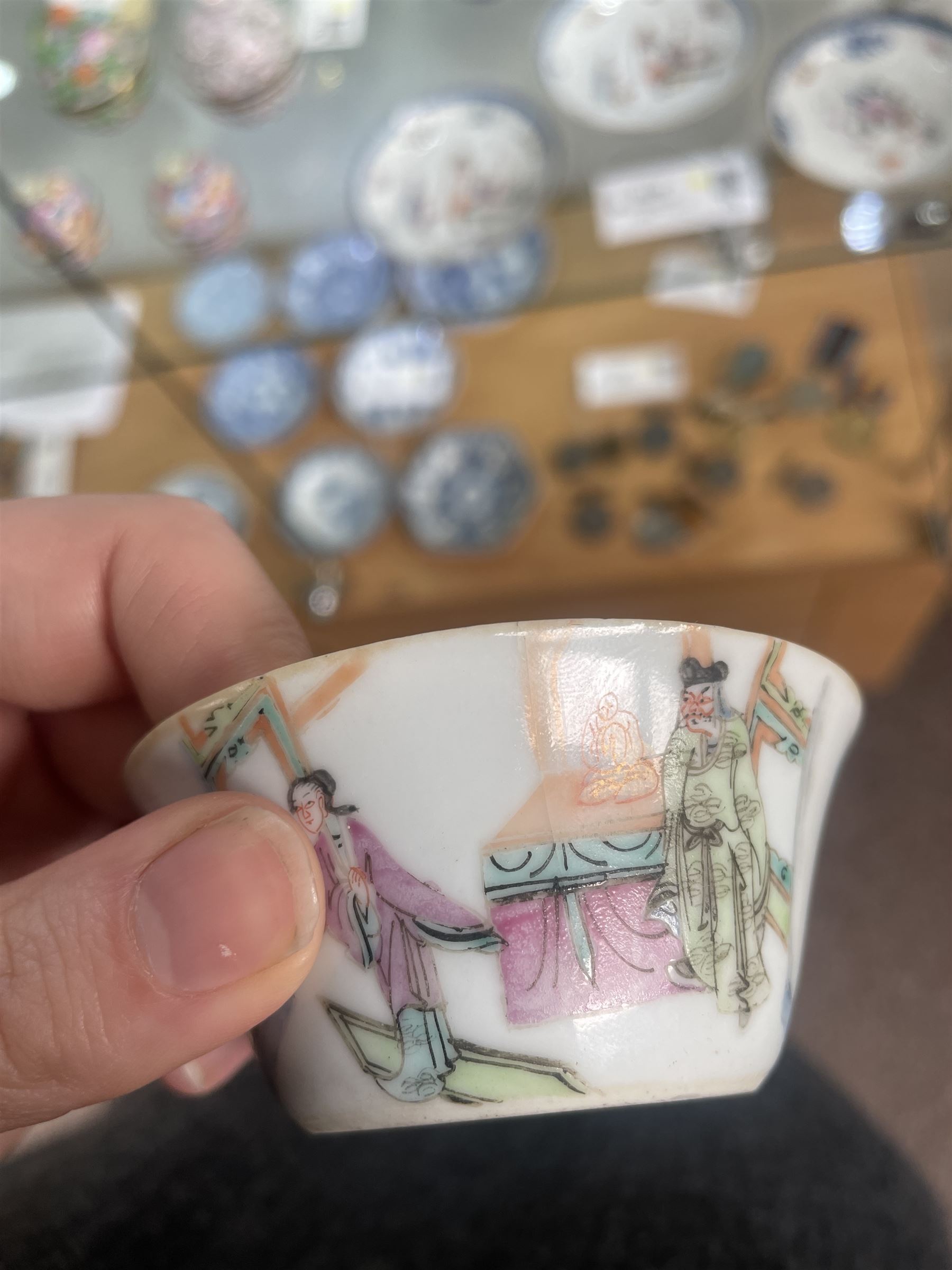 Group of eight 18th century and later Chinese famille rose and similar painted teabowls and dishes, to include unmarked peony cup, small cup decorated with flowers and butterfly, cup decorated with female figure gazing out of a window in a Buddhist temple with indistinct square character mark to base, pair of saucers unmarked, and others with character scenes unmarked (8)