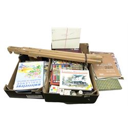 Daler Rowney artist's easel together with a collection of art supplies, including paints, brushes and books, two boxes. 