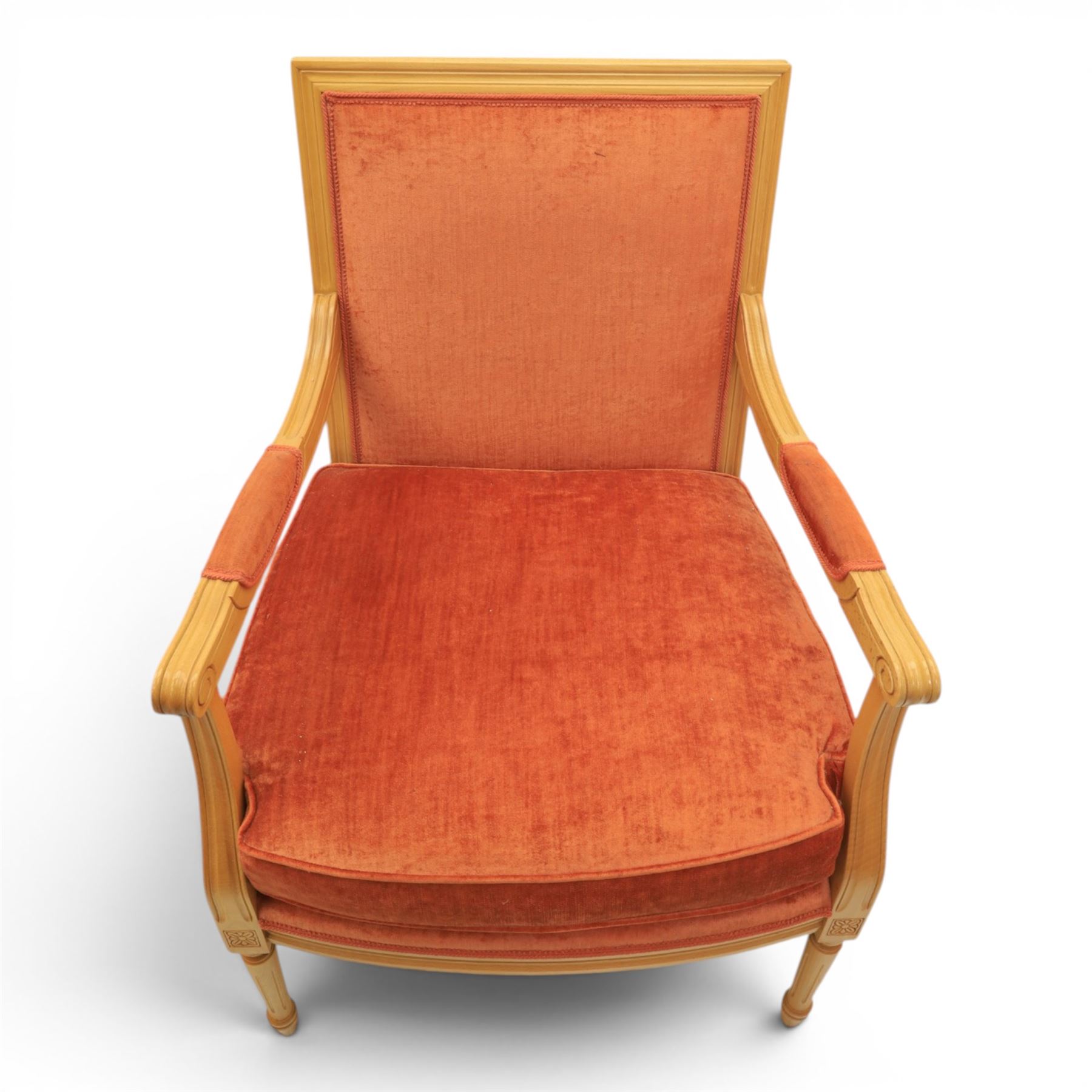 Pair of mid-20th century beechwood fauteuil armchairs, upholstered backrest and seat in terracotta velvet fabric, padded armrests with scroll detail, on tapered fluted supports with carved floral rosette blocks (very modern and not a desirable timber)