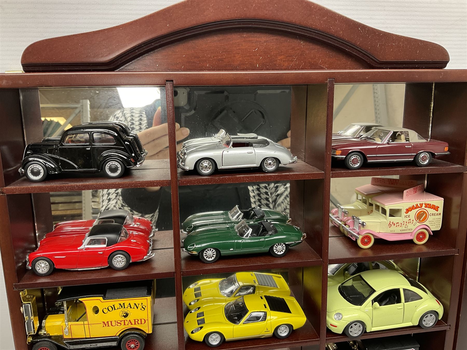 Collection of die-cast vehicles to include Corgi, Dinky, Lledo and Days Gone, housed in six wood display units