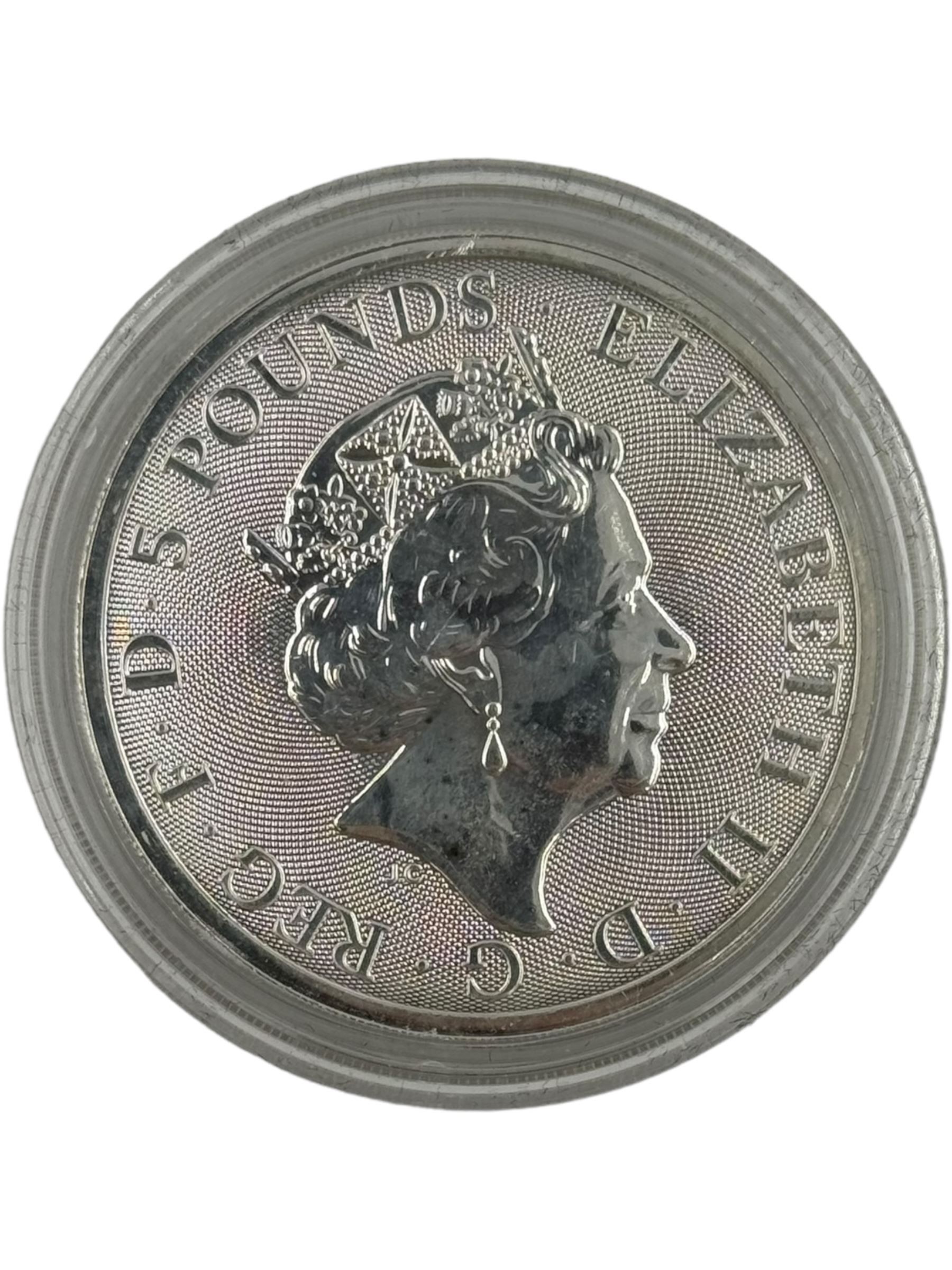 Eleven Queen Elizabeth II 'Queen's Beasts' two ounce fine silver coins, including 2016 'Lion of England', 2017 'Griffin of Edward', 2018 'Black Bull of Clarence' etc, housed in a display case