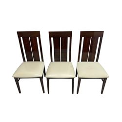 Large American walnut rectangular dining table on square block supports, together with set eight high back dining chairs with cream upholstered seats, the top and chair backs with matching inlaid geometric banding