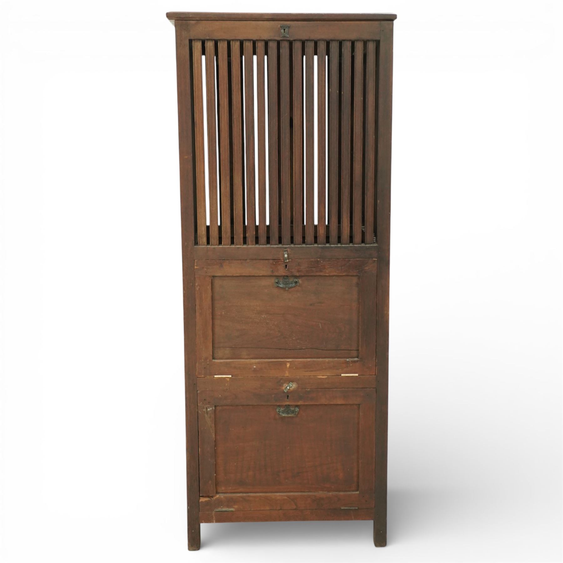 19th century Anglo Indian teak clothes airer cabinet, the rectangular top above a slatted upper compartment enclosed by twin doors, over two fall front compartments with metal drop handles, plain panelled sides and raised on square section supports