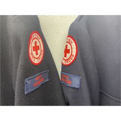 1950s British Red Cross North Yorkshire dress uniform comprising tunic, trousers, greatcoat and visor cap; bears manuscript label '1956 Ware'