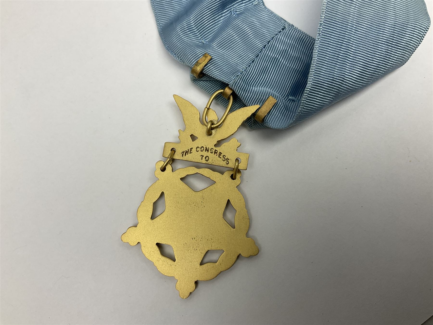 United States of America, Congressional Medal of Honor, gilt metal and enamel, unnamed, reverse of suspension engraved ‘The Congress to’, the neck cravat with pop stud attachments, boxed with felt bag