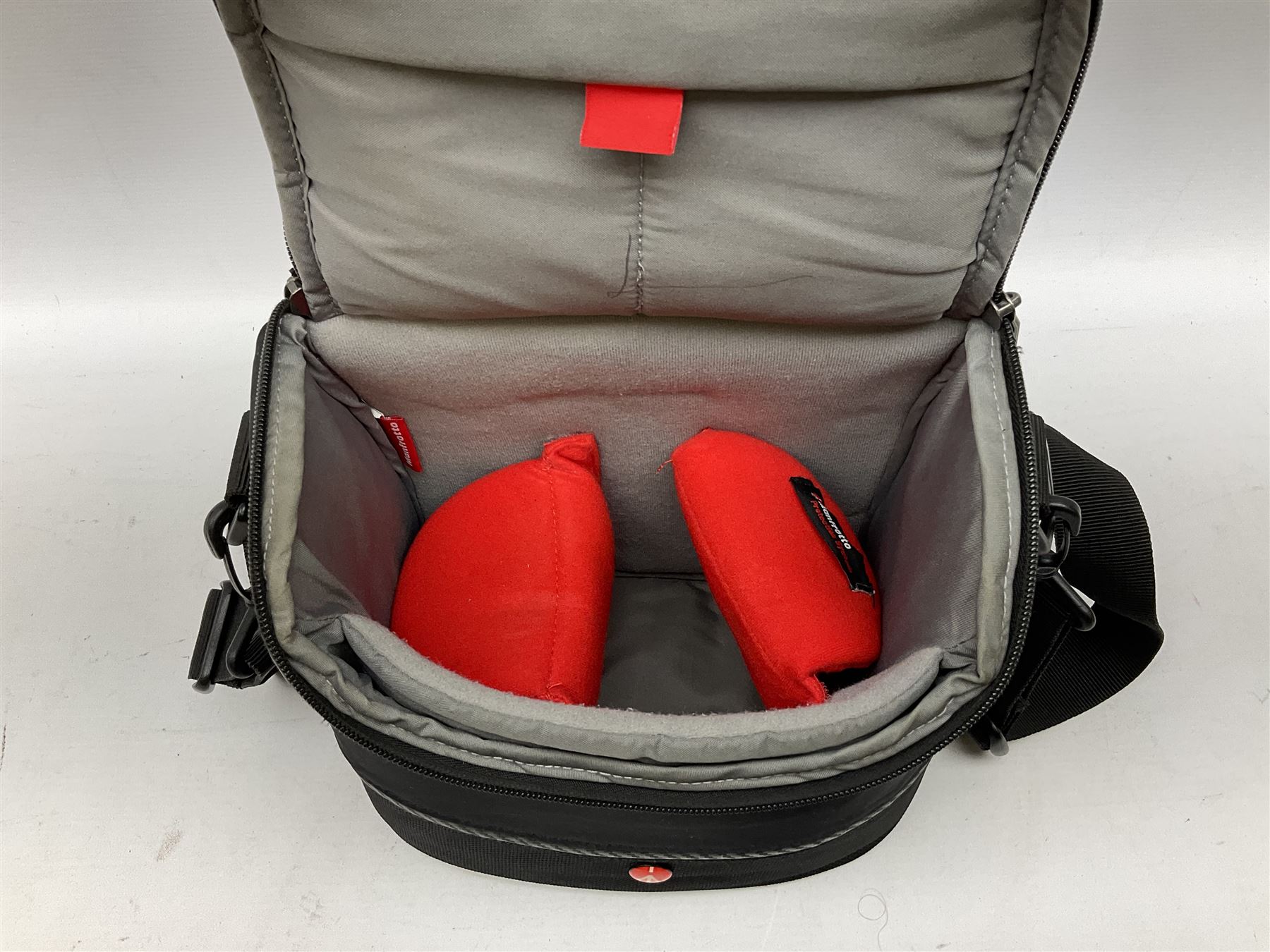 Sony Alpha 7R ILCE-7R camera serial number 3985636, with a 'Carl Zeiss Sonnar FE 1.8/55 ZA' lens, 'FE 28mm F2' lens, Sony Handycam Cyber-Shot HVL-F43M, all with original boxes, together with a Manfrotto camera bag  