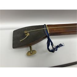 Fruitwood and elm single string phono fiddle with long neck and copper horn L76cm; and a violin bow (2)