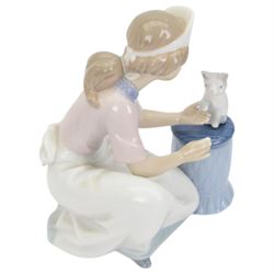 Four Lladro figures, comprising Loving Care no 6087, Young Nurse no 6307, Girl with Chicken no 4592 and Female Physician no 5197, three with original boxes 