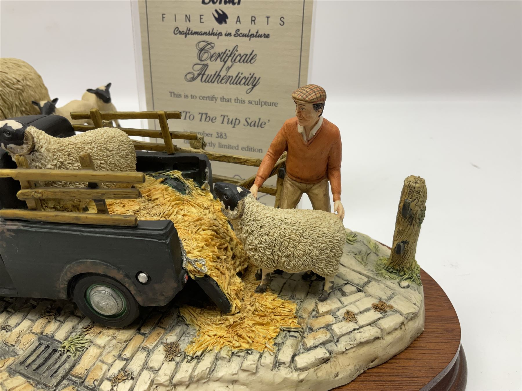 Two Border Fine Arts figure groups, comprising Black faced Ewe & Border Collie no B104 by Ray Ayres and To The Tup Sale, no JH72 limited edition 383/1850, both on wooden base, one with certificate