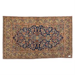 Persian Kashan rug, navy field with lobed central medallion and scrolling floral sprays, i...