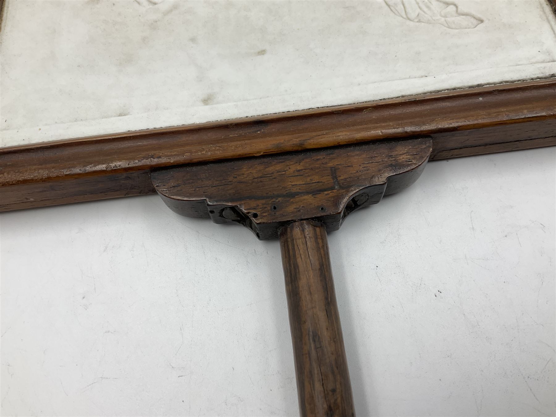 KPM Berlin lithophane panel, of two angels supporting a female figure to the centre, encased in a rosewood frame and handle, H42cm