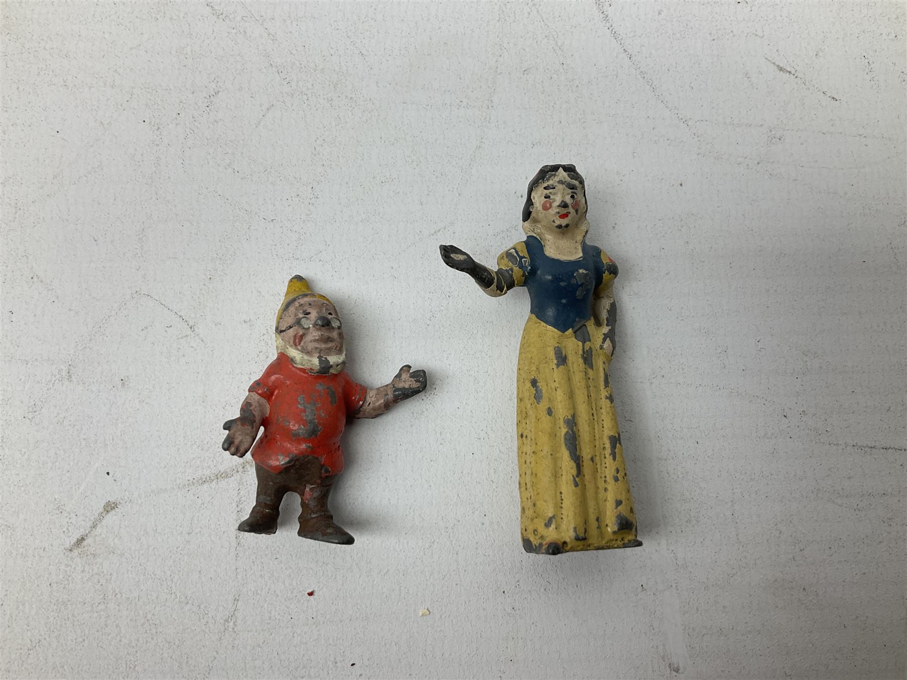 Collection of twenty-two Britains Cadbury's Cococubs play worn lead painted figures to include Mr Pie Porker, Mrs Pie Porker, Tiny Tusks, Captain Kangaroo, Granny Owl and others, Britains Snow White and Doc lead figures and other painted lead figures (30)