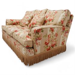 Edwardian design two-seat sofa (W165cm, H83cm, D106cm); and matching pair of armchairs (W80cm); upholstered in striped fabric decorated with floral bouquets and gold fridge