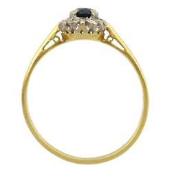 18ct gold oval sapphire and diamond cluster ring, hallmarked 
