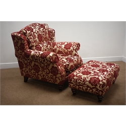  Grande traditional style armchair upholstered in a red and gold embossed fabric with complimentary arm-covers (W105cm) and matching footstool  
