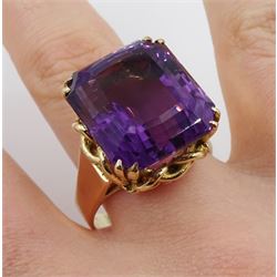 Large gold single stone amethyst ring, with knot design gallery, stamped 9ct