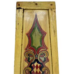 Two early 20th century fairground 'Chair-O-Plane' panels, wooden framed with sheet metal panels, painted in yellow with scrolled cartouche decoration in red, gold and green