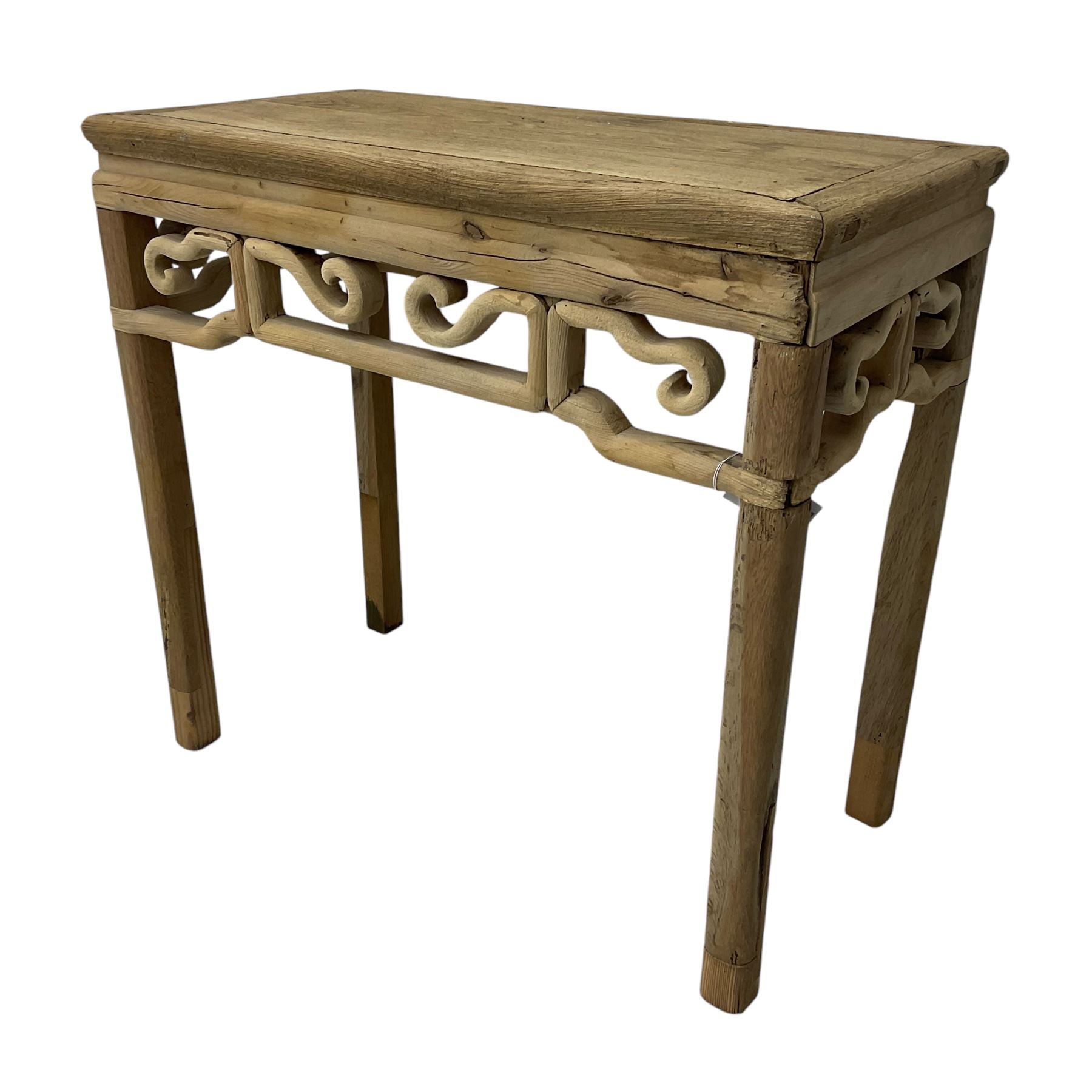Chinese Ming design elm side table, rectangular top over shaped frieze rails, on square supports with curved outer edge 