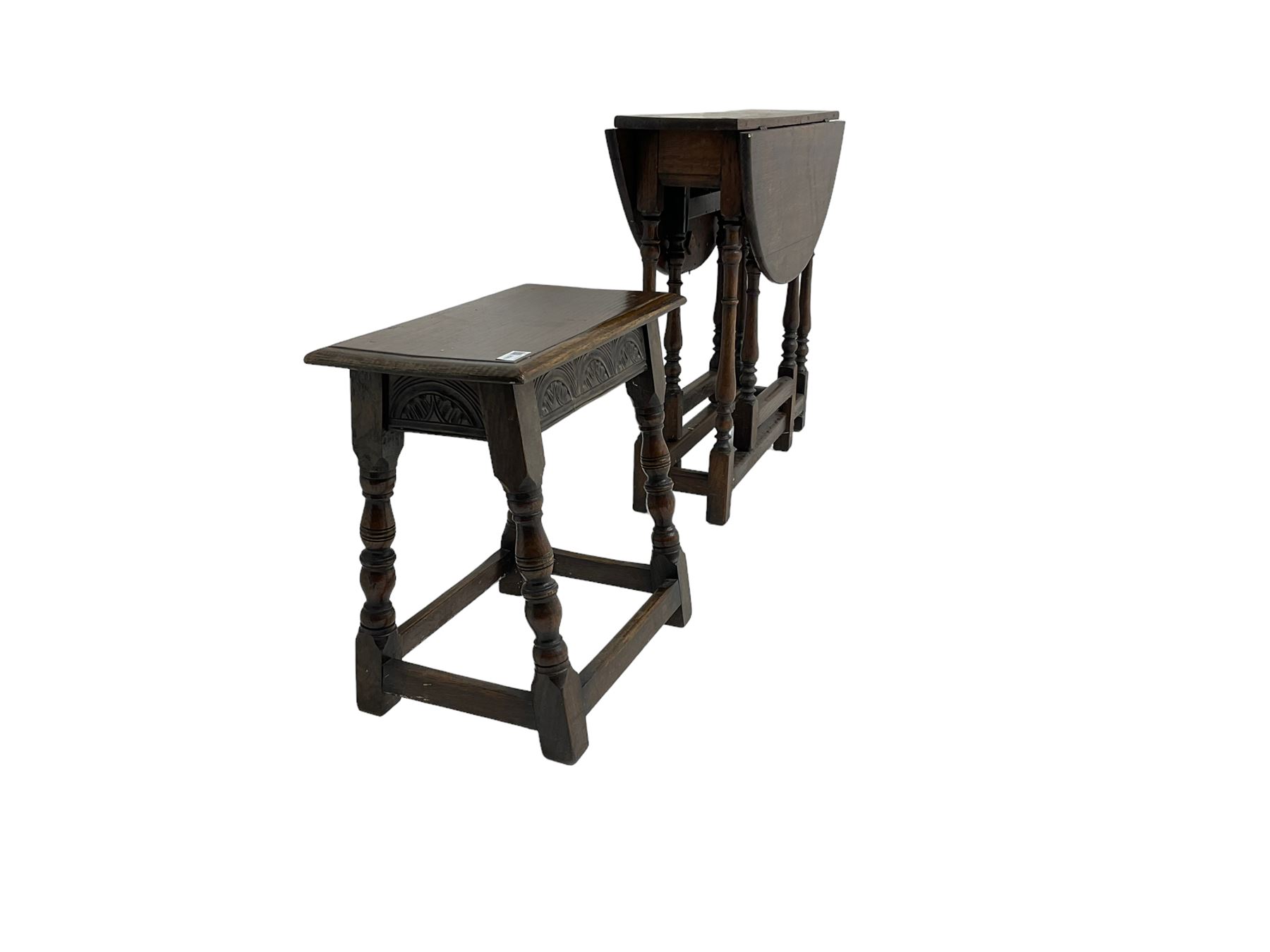 17th century design oak coffin or joint stool, rectangular top over lunette carved frieze rail, raised on turned supports (W46cm D26cn H45cm); and 19th century small oak drop-leaf gateleg table, circular top raised on turned supports (W80cm H67cm)