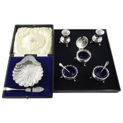Silver scallop shaped dish by Horace Woodward & Co Ltd, Birmingham 1919, boxed and a five piece cruet set by Atkin Brothers, Sheffield 1917, approx 10oz
