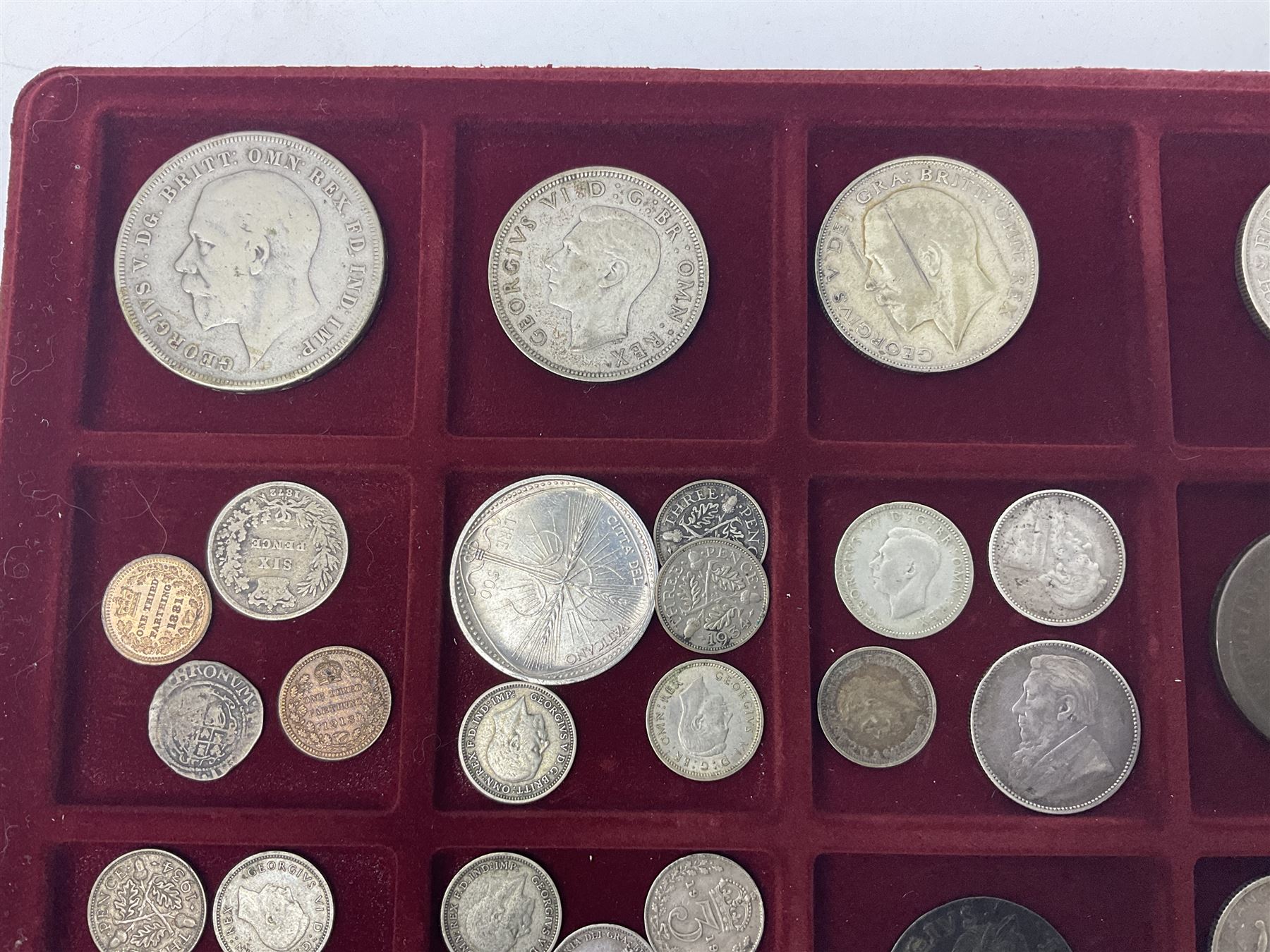 Great British and World coins including King George V 1935 crown, various silver three pence pieces, United States of America 1944 quarter dollar etc, housed in a coin tray
