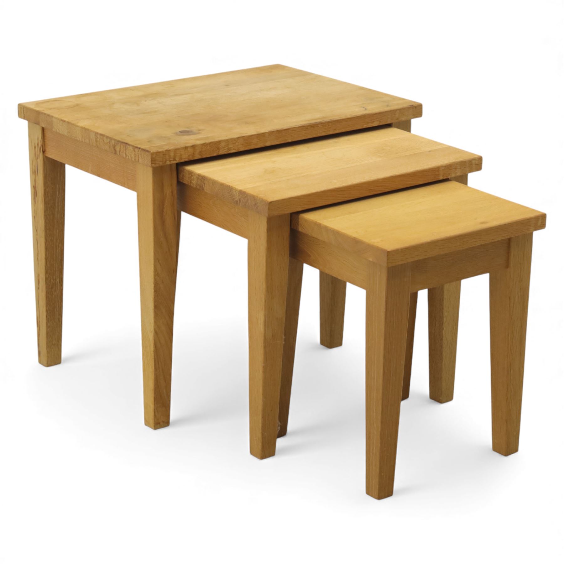 Modern solid oak nest of three tables, each with straight-edged rectangular top and square legs