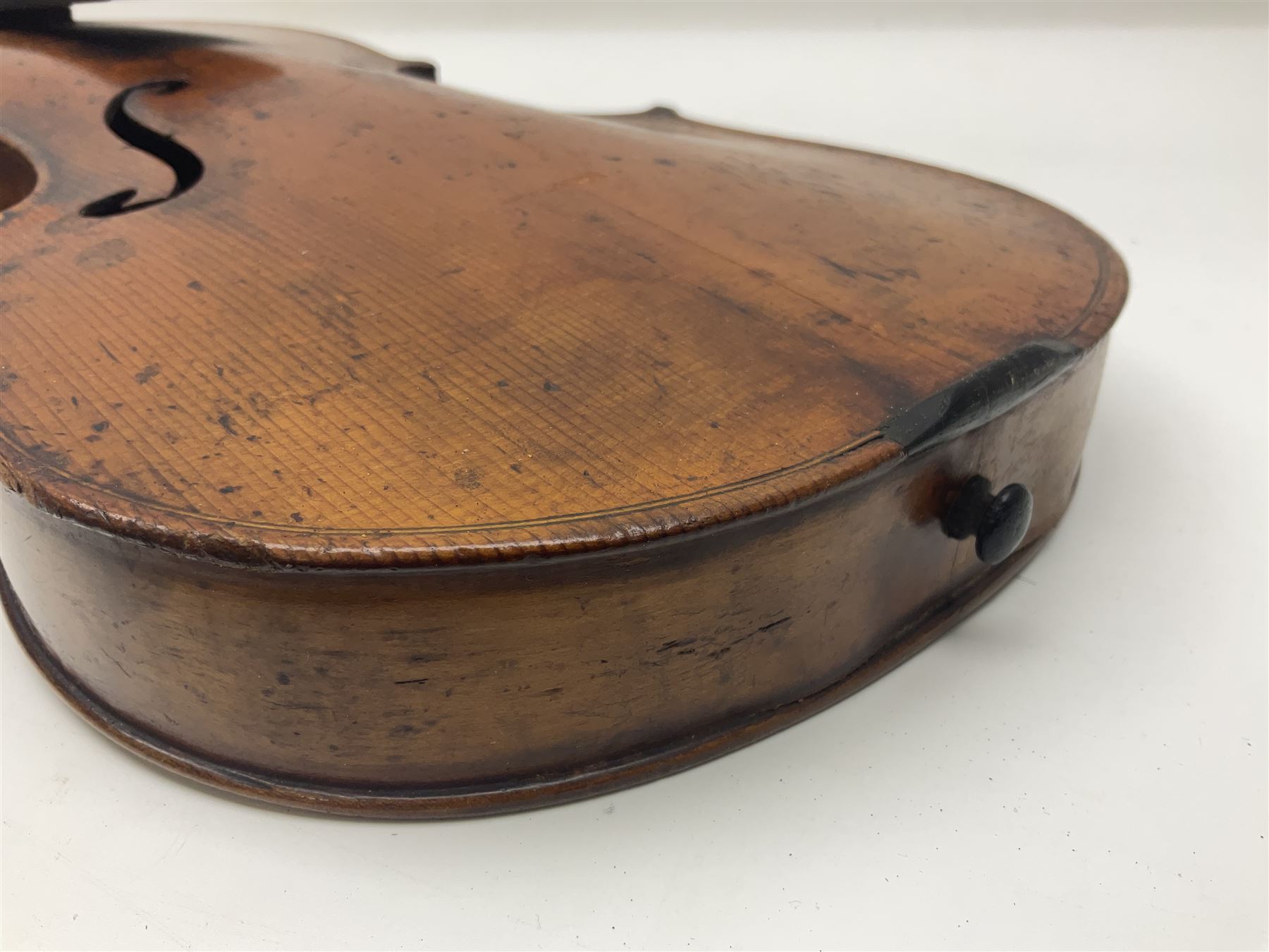 Late 19th century German trade violin c1890 with 36cm two-piece birds-eye maple back, neck and ribs and spruce top; bears label 'Manufactured in Berlin Special Copy of Nicolaus Amati' L59.5cm; in carrying case