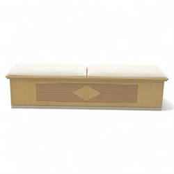 Contemporary maple veneered blanket box, twin upholstered lift-up lids revealing lined storage compartment, geometric panelled front on plinth base