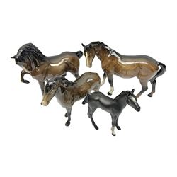 Four Beswick horses, including Exmoor no 1645, Black Beauty foal and two others 