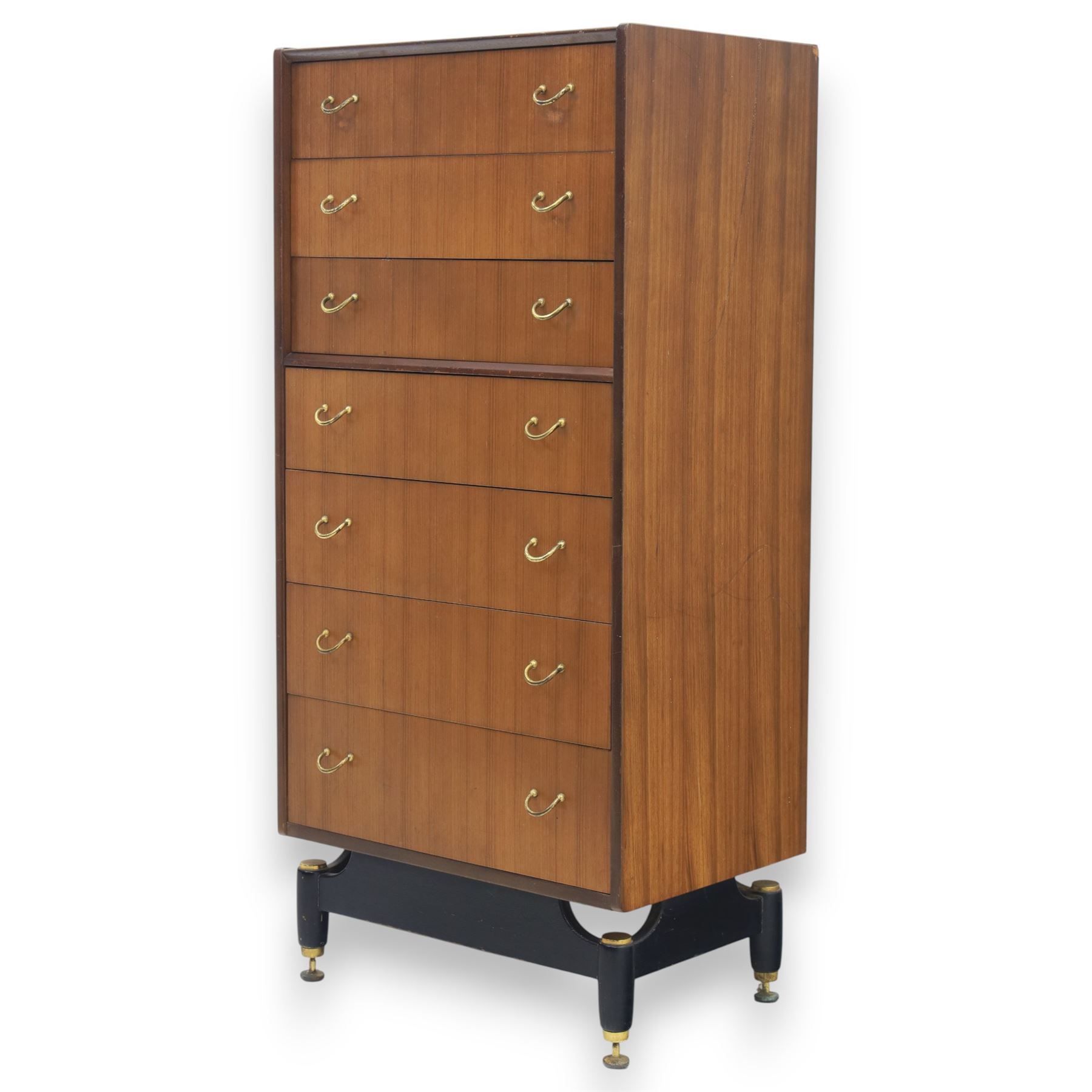 G Plan - 'Librenza' tola wood chest of seven drawers, gold coloured metal pulls on an ebonised based with gold coloured feet