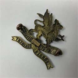 Four Border Regiment cap badges including eleventh battalion (4)