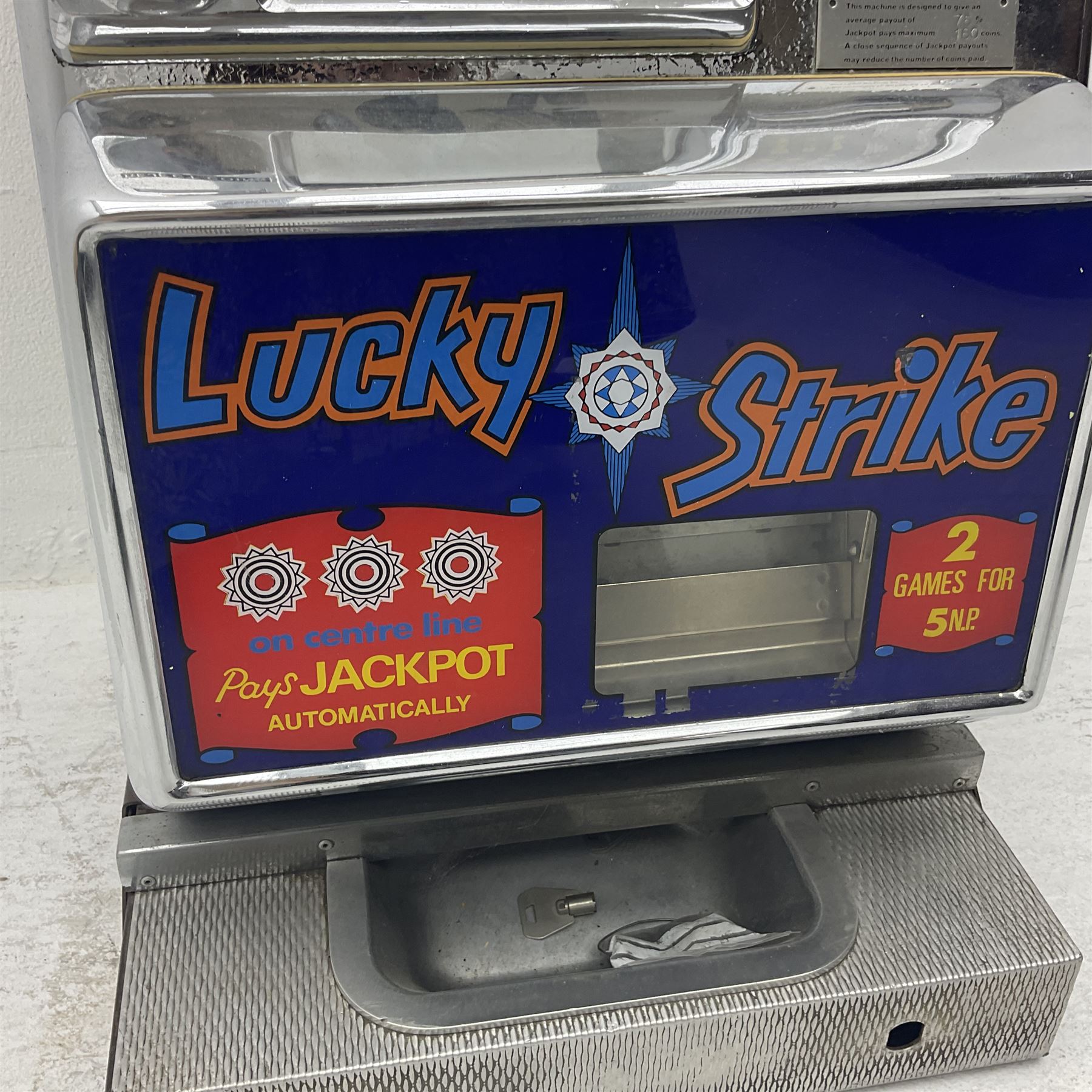 Aristocrat Nevada Lucky Strike one-armed bandit arcade machine, circa 1964, light-up display in aluminium and stainless steel case, with keys, H72cm 